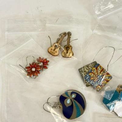 LOT 133: Eleven Pairs of Pierced Earrings