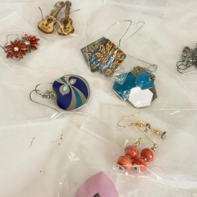 LOT 133: Eleven Pairs of Pierced Earrings