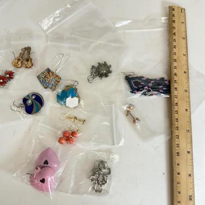 LOT 133: Eleven Pairs of Pierced Earrings