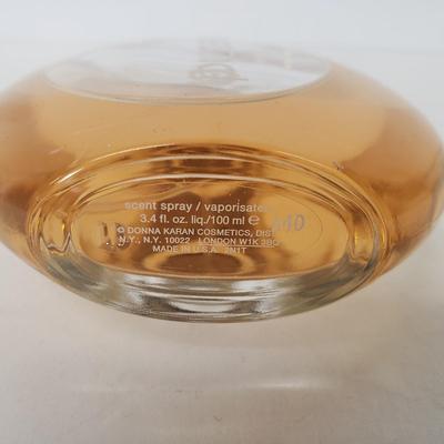 LOT 150: Pure DKNY Drop of Vanilla 3.4 oz & Sealed Elizabeth Arden True Love 3.3 oz