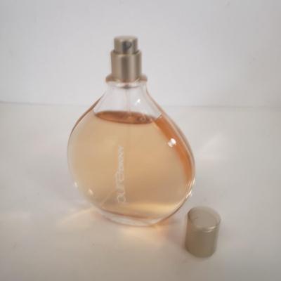 LOT 150: Pure DKNY Drop of Vanilla 3.4 oz & Sealed Elizabeth Arden True Love 3.3 oz