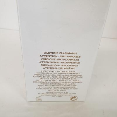 LOT 150: Pure DKNY Drop of Vanilla 3.4 oz & Sealed Elizabeth Arden True Love 3.3 oz