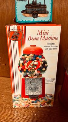 MINI JELLY BELLY BEAN MACHINE, RIVER BOAT PENCIL SHARPENER AND A WOODEN TOP