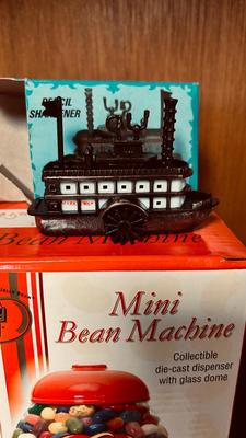 MINI JELLY BELLY BEAN MACHINE, RIVER BOAT PENCIL SHARPENER AND A WOODEN TOP