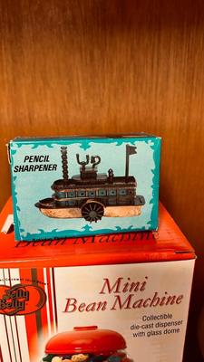 MINI JELLY BELLY BEAN MACHINE, RIVER BOAT PENCIL SHARPENER AND A WOODEN TOP