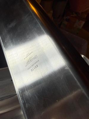 Metal trays-one with small holes