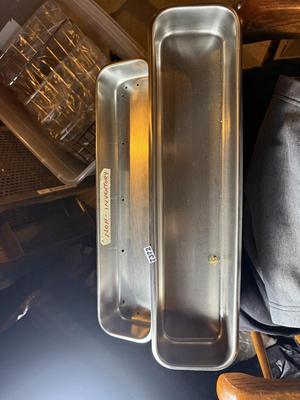 Metal trays-one with small holes