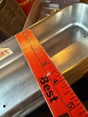 Metal trays-one with small holes