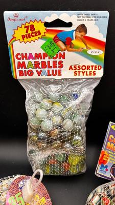 3 PACKAGES OF UNOPENED MARBLES