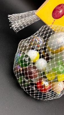 3 UNOPENED PACKAGES OF MARBLES