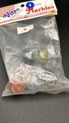 3 UNOPENED BAGS OF MARBLES AND A FEW LIKE MARBLES