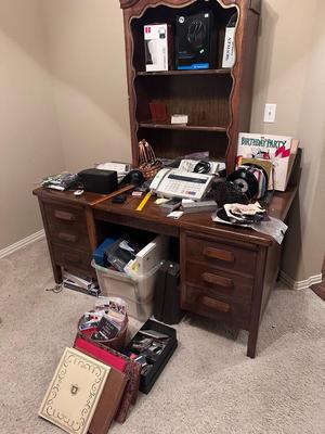 Desk Full of Electronics and Records
