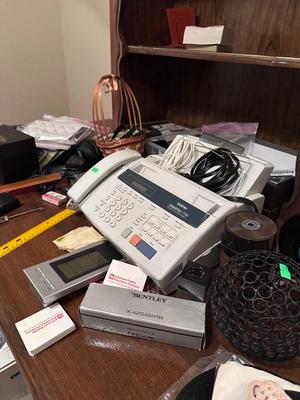 Desk Full of Electronics and Records