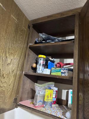 Fertilizer Spreader, Miscellaneous Shelves of tools and fasteners