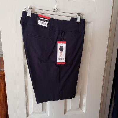 LOT 50Z: Closet Full of 100 Pairs of Pants-Some New with Tags