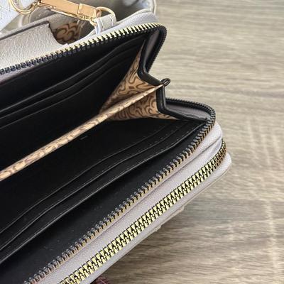 LOT 70D: Tech & More Wallets: Carpisa, NWT & More