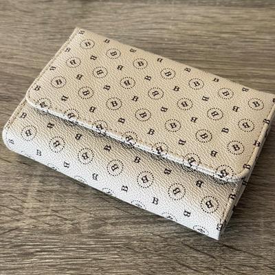 LOT 70D: Tech & More Wallets: Carpisa, NWT & More