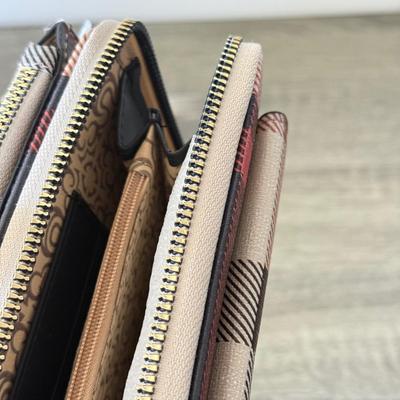 LOT 70D: Tech & More Wallets: Carpisa, NWT & More