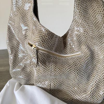 LOT 76L: Collection of Purses: Guess, Tianni Faux Fur, Maxine Couture & MultiSac