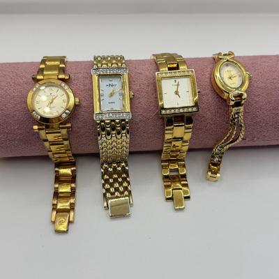 LOT 130: Goldtone Watches: Monroe Quartz, Timex & Piere Cardin