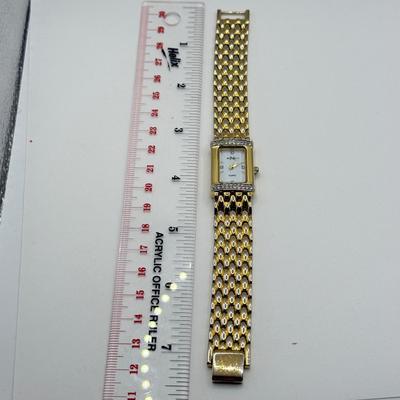 LOT 130: Goldtone Watches: Monroe Quartz, Timex & Piere Cardin