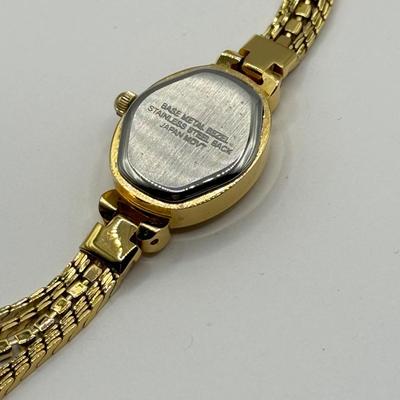 LOT 130: Goldtone Watches: Monroe Quartz, Timex & Piere Cardin