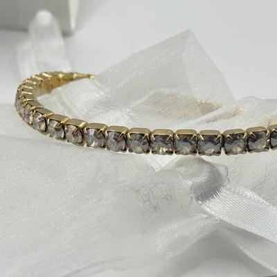 LOT 136J: Three Swarovski Bracelets w/ Tags