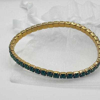 LOT 136J: Three Swarovski Bracelets w/ Tags