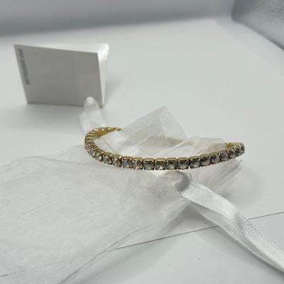 LOT 136J: Three Swarovski Bracelets w/ Tags