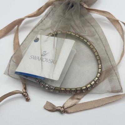 LOT 136J: Three Swarovski Bracelets w/ Tags