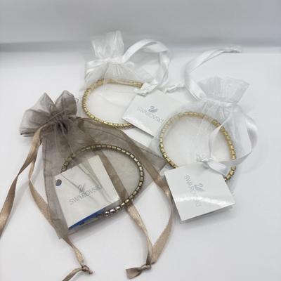 LOT 136J: Three Swarovski Bracelets w/ Tags
