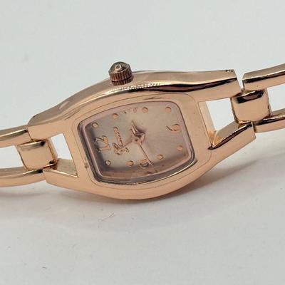 LOT 138J: Rose Gold Jewelry Collection: Apple Watch Band, Henri Bendel Bangles, Studio Time Quartz Cuff Watch, Geneva Watch & More