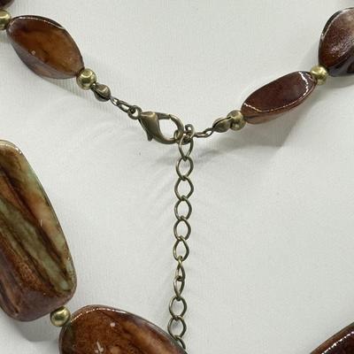 LOT 147J: Earth Tone Jewelry: Statement Necklaces, Earrings & Crystal Bracelet