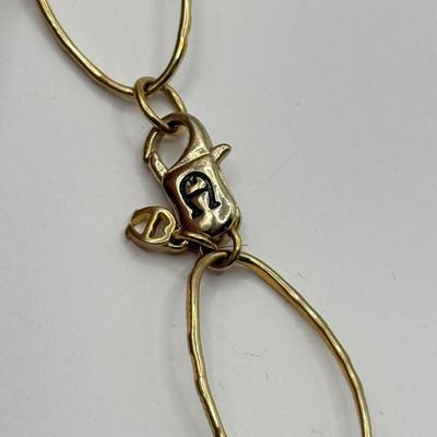 LOT 157J: Collection of Goldtone Necklaces: Aigner, Monet & More