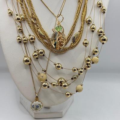 LOT 157J: Collection of Goldtone Necklaces: Aigner, Monet & More