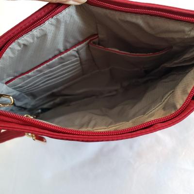 LOT 163Z: Collection of Travel Bags by Travelon, Kenneth Cole, Liz Claiborne & More