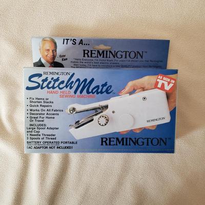 LOT 166Z: Sewing Notions, Rowenta Steamer, Stitch Mate(NIB) & Pack of Wooden Hangers