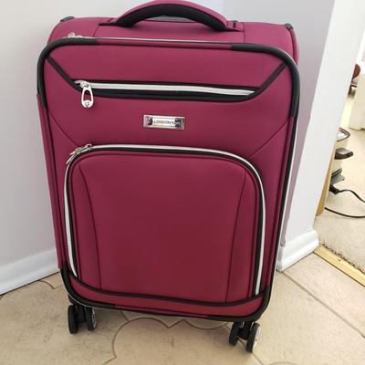 LOT 201L: Rolling Carry On Luggage by London Fog & Journey