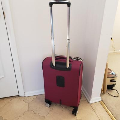 LOT 201L: Rolling Carry On Luggage by London Fog & Journey