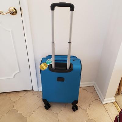 LOT 201L: Rolling Carry On Luggage by London Fog & Journey