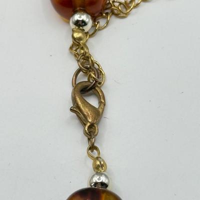 LOT 213J: Earth Tone Bead and Wire Chico's Necklace, Casual Corner Necklace, Frog Ring & More