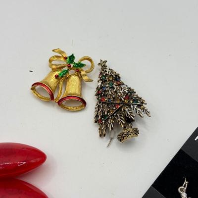 LOT 214: Holiday Jewelry & More: Swarovski Christmas Stocking Charm, Trifari White/Goldtone Clip Hoops, Gerry's & Art...