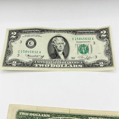 LOT 231C: US $2 Bills & John Tyler Liberty Dollar Coin