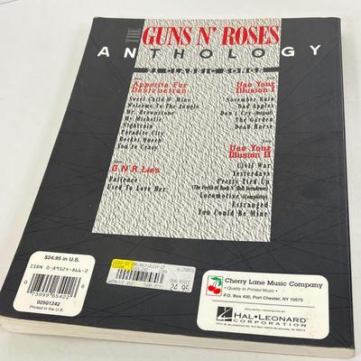 LOT 64: Musical Memories - Ozzy Osbourne Bobble Head, Guns N' Roses Sheet Music Book, Elvis Collectible Pen