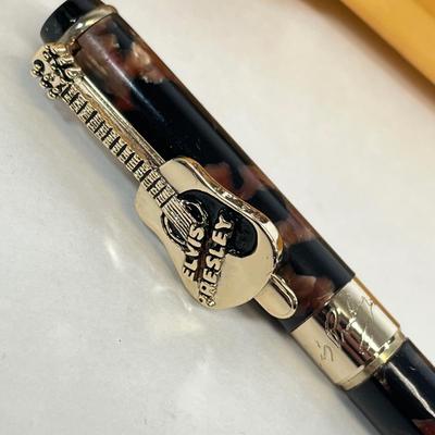 LOT 64: Musical Memories - Ozzy Osbourne Bobble Head, Guns N' Roses Sheet Music Book, Elvis Collectible Pen