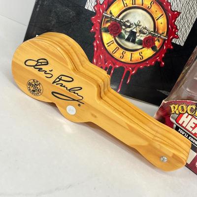 LOT 64: Musical Memories - Ozzy Osbourne Bobble Head, Guns N' Roses Sheet Music Book, Elvis Collectible Pen