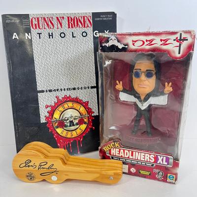 LOT 64: Musical Memories - Ozzy Osbourne Bobble Head, Guns N' Roses Sheet Music Book, Elvis Collectible Pen