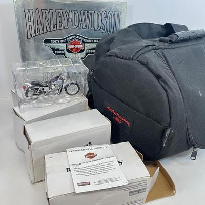 LOT 66: Harley Davidson Items - Storage Bag, History Book, Model Motorcycles