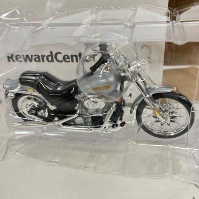 LOT 66: Harley Davidson Items - Storage Bag, History Book, Model Motorcycles