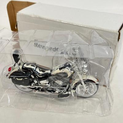 LOT 66: Harley Davidson Items - Storage Bag, History Book, Model Motorcycles